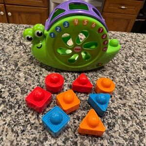 Fisher-Price Snail Shape Sorter with Green and Purple